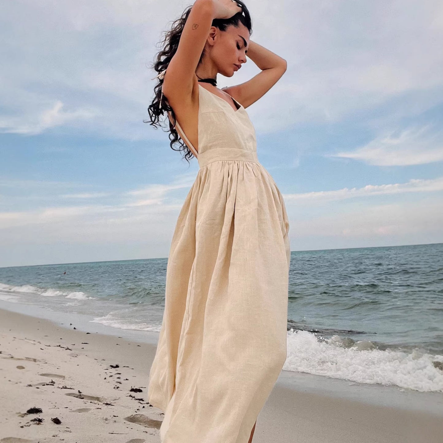 Women's Early Summer Loose Strap Backless Temperament Vacation Sexy Dress